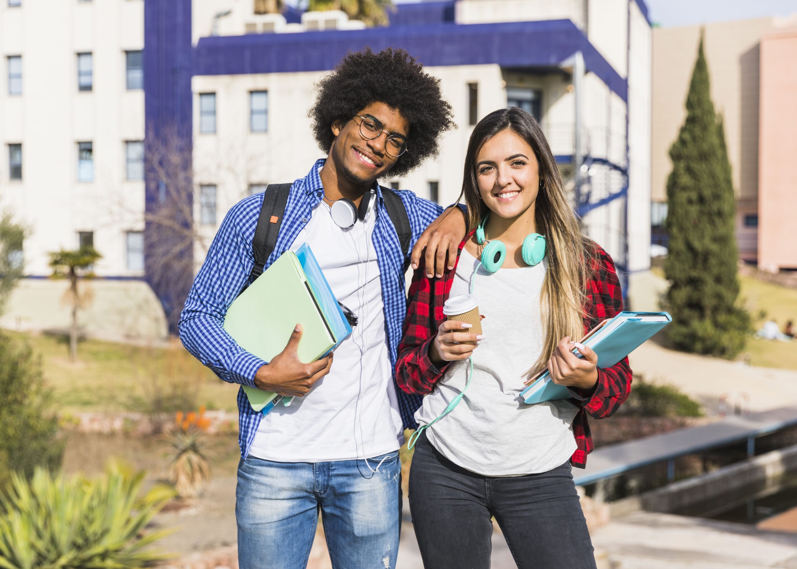 Comprar Diploma Pedagogia 1 happy mixed race couple posing front university building 1 scaled 1
